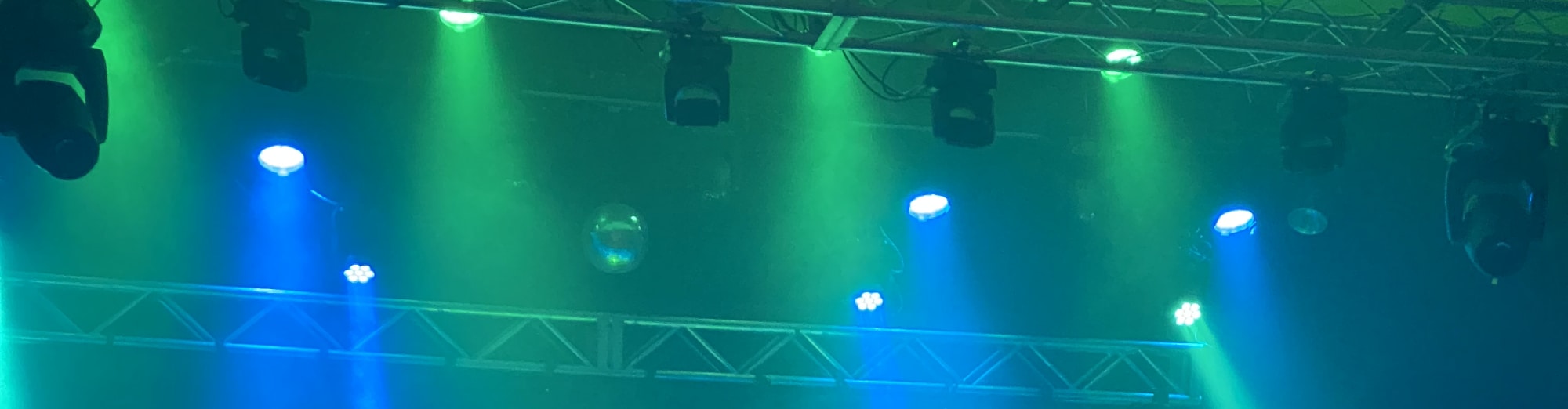 blue and green theater stage lights Madison