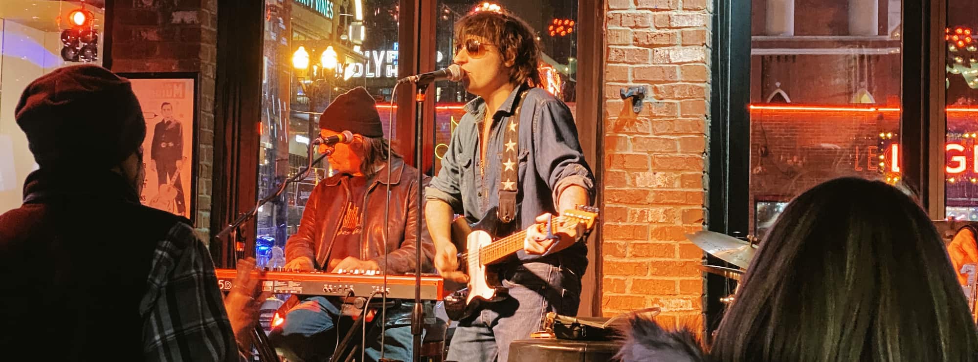 bar singer on guitar in Madison